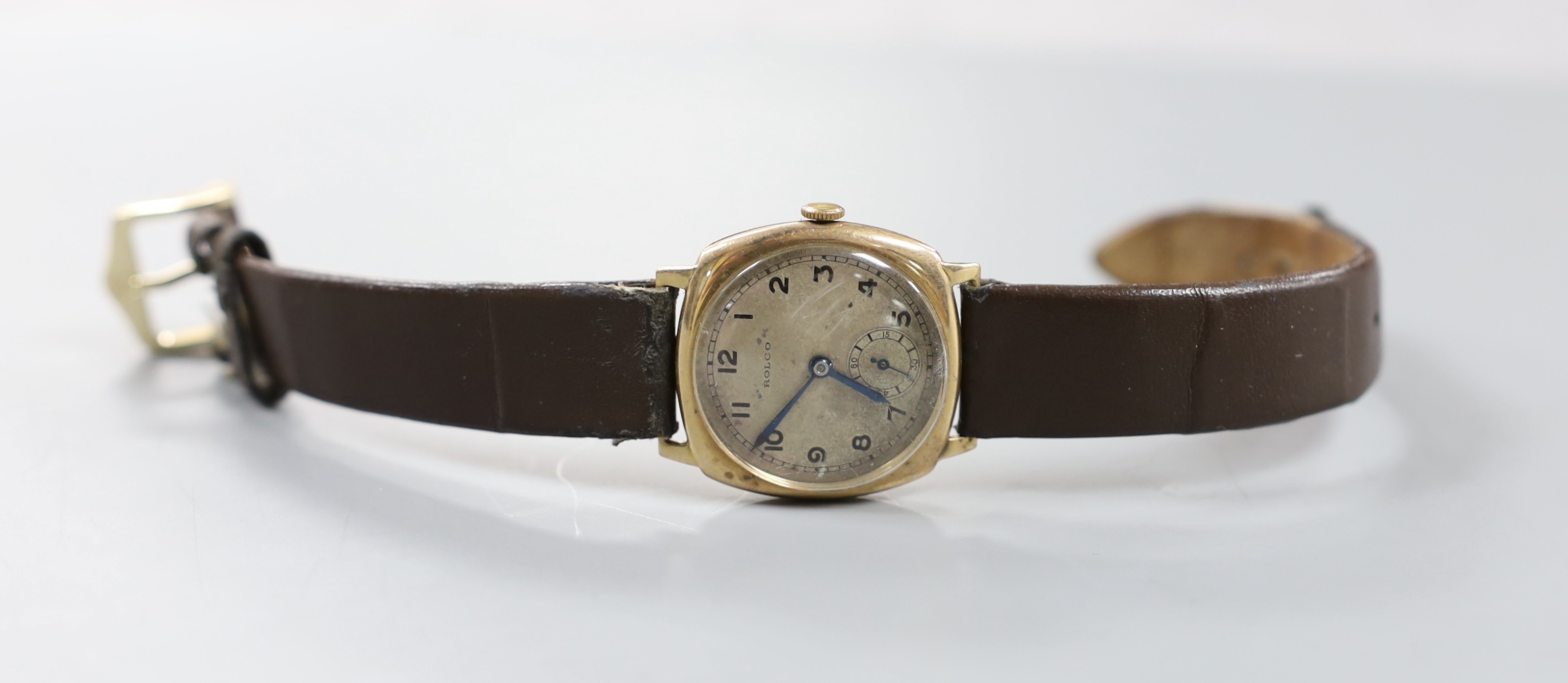 A gentleman's 1930's 9ct gold manual wind wrist watch, with Arabic dial signed 'Rolco' and subsidiary seconds, unsigned movement, the Rolex Watch Co. case diameter 29mm.